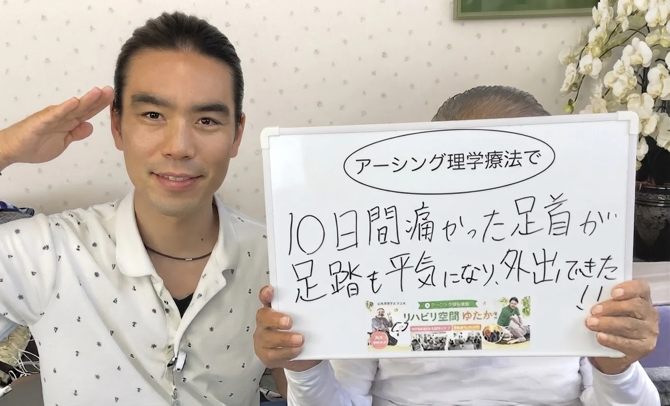 体験ボードを手にする垣内正行さん